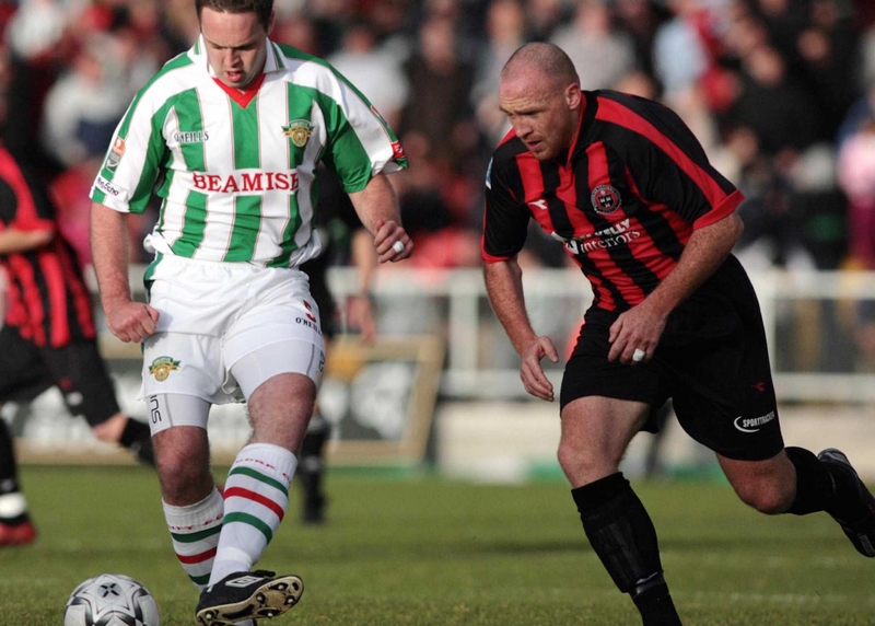 Bohemians striker Glen Crowe is closely watched by Cork City's Brian O'Callaghan
