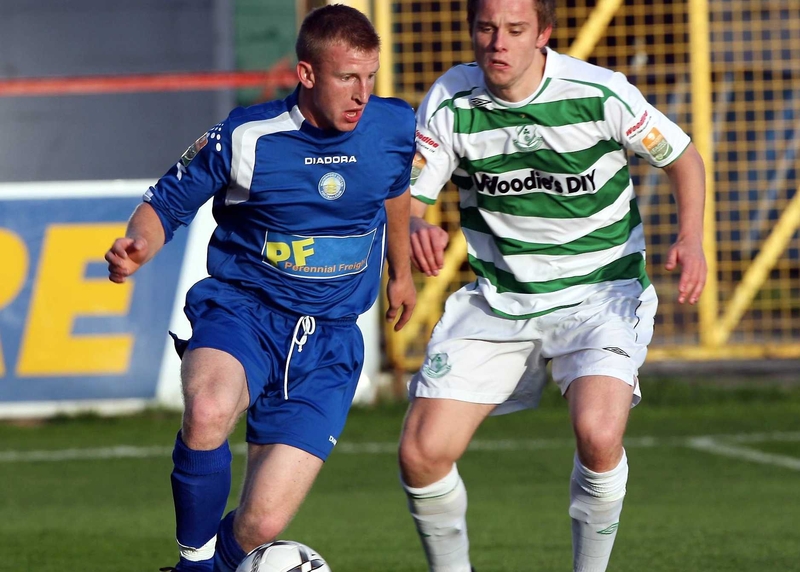 Waterford United's Daryl Kavanagh and Shamrock Rovers' Ger O'Brien in action before their eircom Premier Division fixture was abandoned