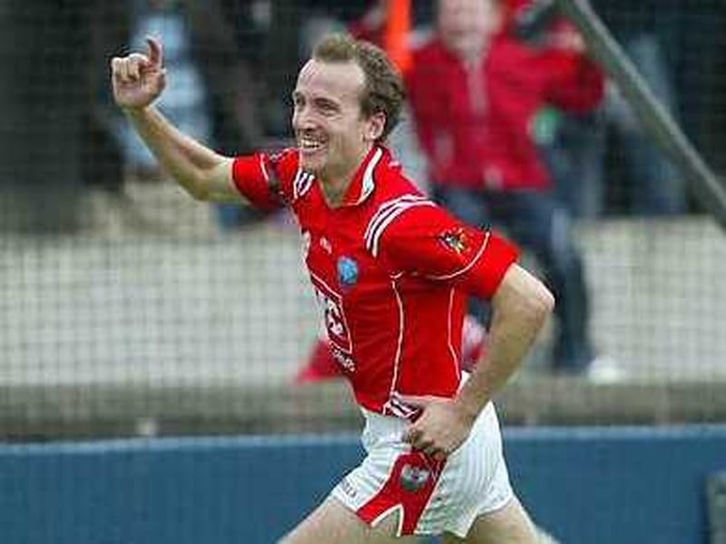 Nicky McDonnell wheels away after his late goal for Louth