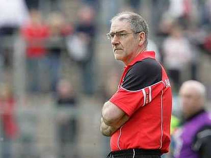 Mickey Harte does not believe it is right to deprive clubs of all their county players during Championship season