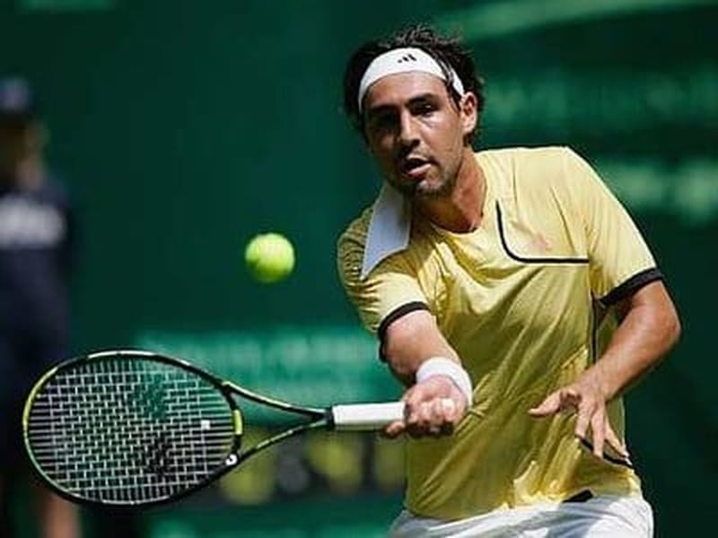 Marcos Baghdatis beat Nikolay Davydenko in straight sets