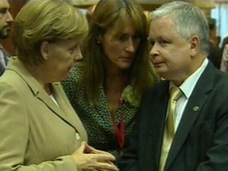 Rough Relations - Angela Merkel (left), with ousted PM Lech Kaczynski last June, is relieved by this weekend's results
