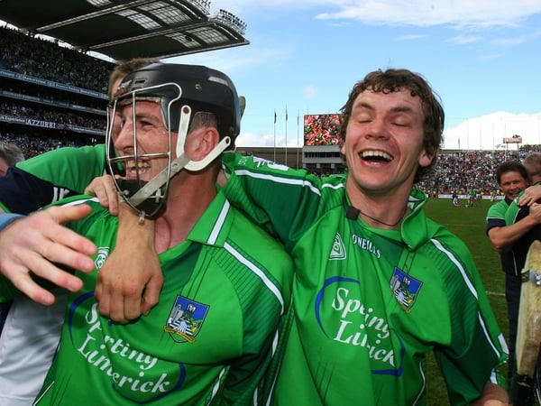 Limerick's Mark O'Riordan and Mike O'Brien celebrate at the final whistle