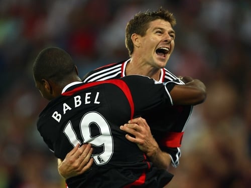Steven Gerrard celebrates a pre-season goal with new signing Ryan Babel