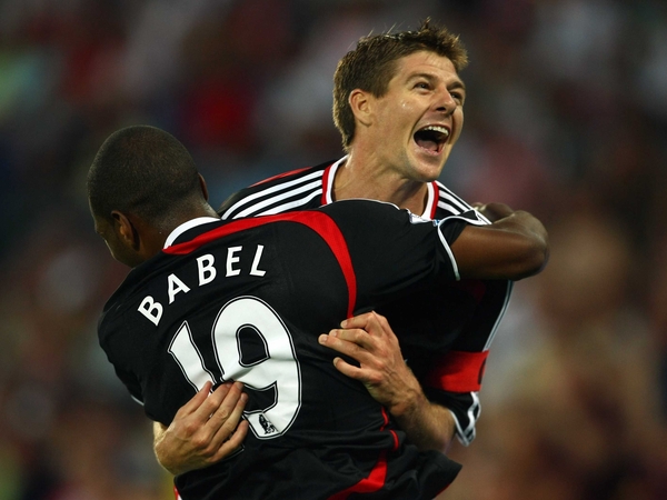 Steven Gerrard celebrates a pre-season goal with new signing Ryan Babel