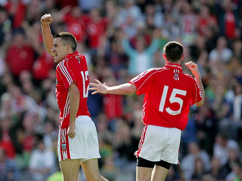 Kevin McMahon (l) celebrates his goal against Meath