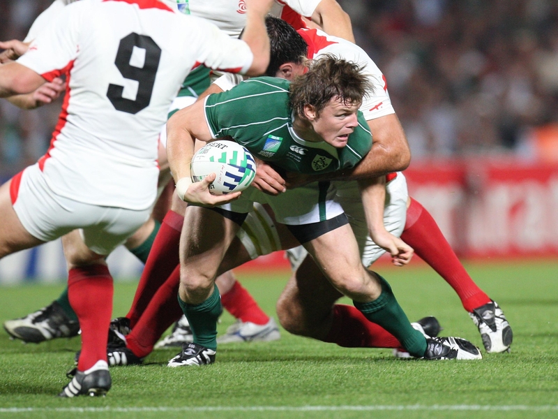 Captain Brian O'Driscoll goes for another offload