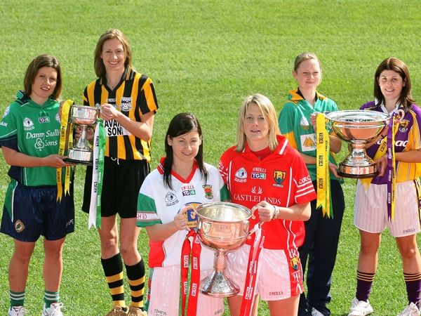 Last year's finalists with the three trophies at Croke Park