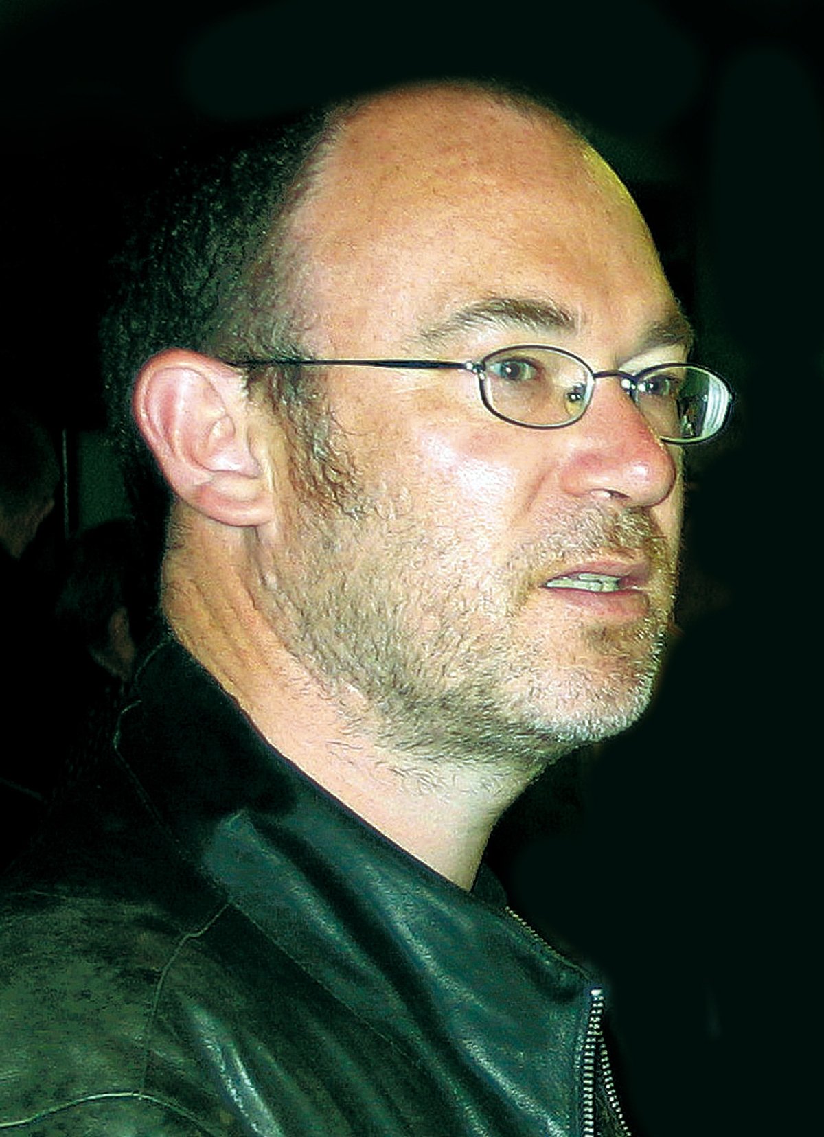 Darach Ó Scolaí, Údar.