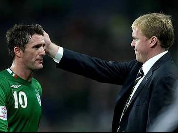 Steve Staunton consoles Robbie Keane after the game