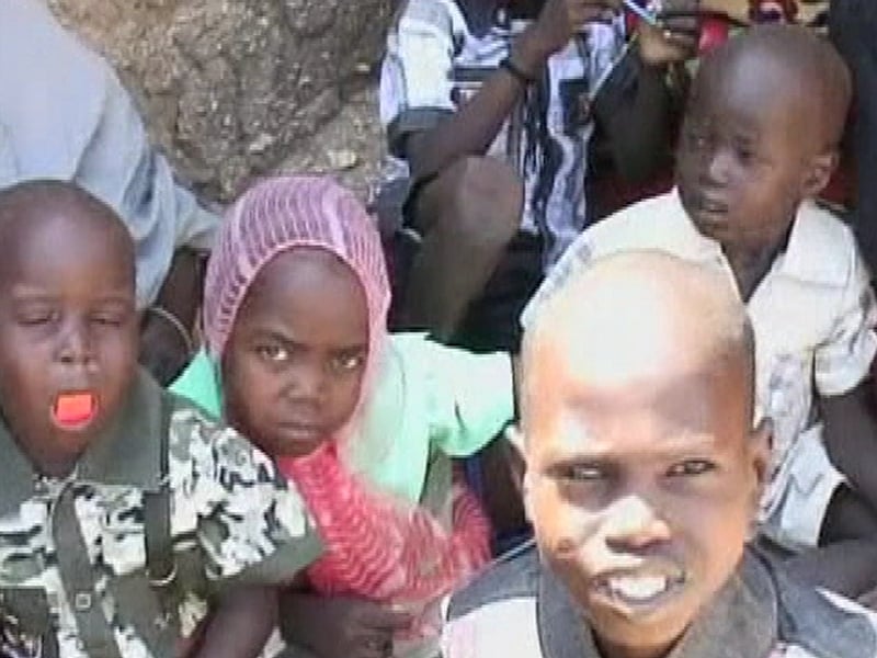 Darfur children - Charity says it acted legally