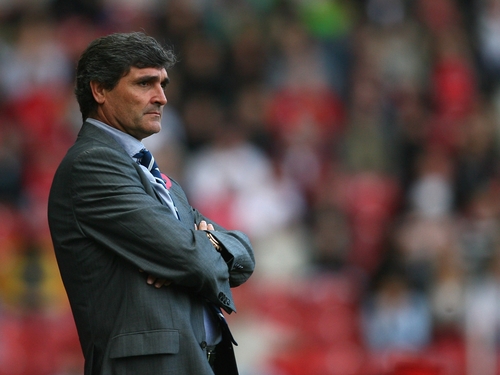 Juande Ramos's Spurs left it late against Portsmouth