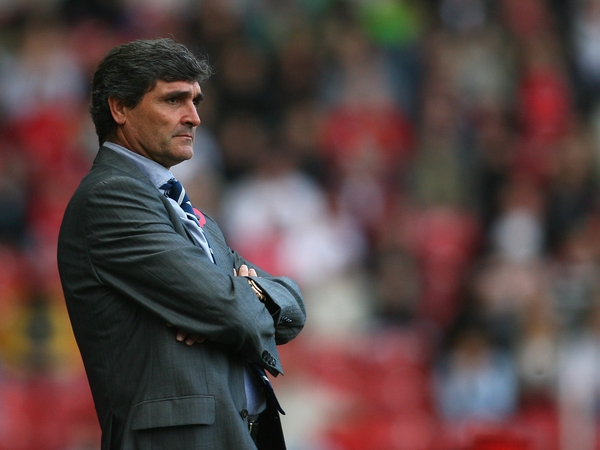 Juande Ramos's Spurs left it late against Portsmouth