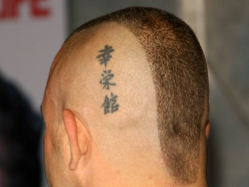 Judging the Judges - This tattoo on a shaved head is a double violation of the rules for Chinese judges