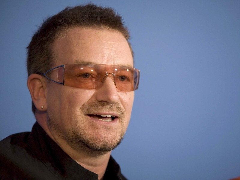 Bono injured his back while rehearsing in Germany.