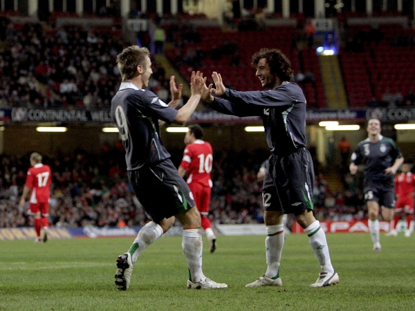Reading team-mates Kevin Doyle and Stephen Hunt celebrate Ireland's second goal in Cardiff