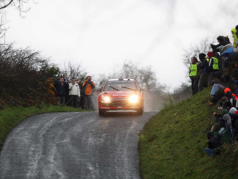 Sebastian Loeb comes over the brow of a hill during today's Tempo stage