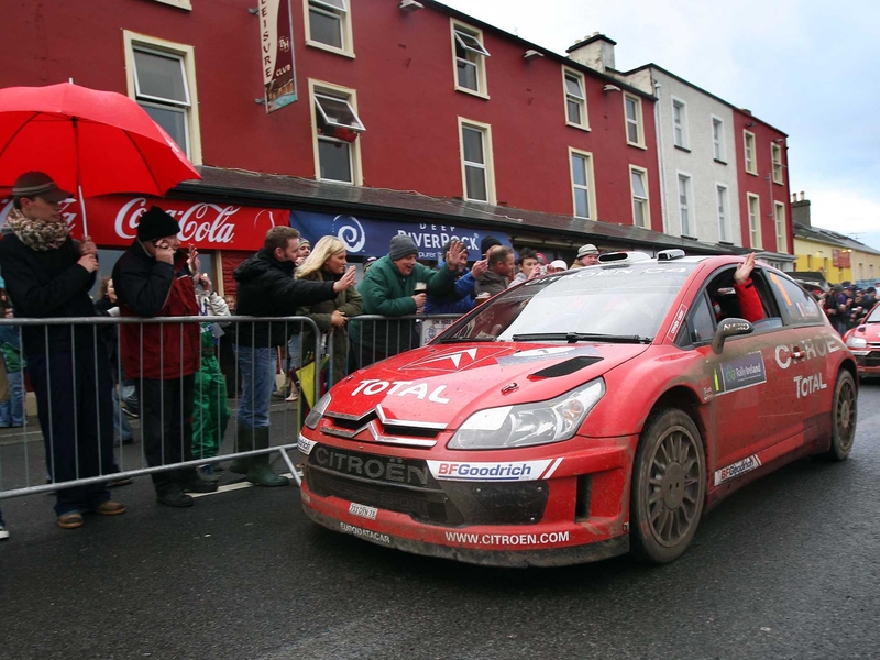 Sebastien Loeb waves to fans after winning the final stage at Mullaghmore
