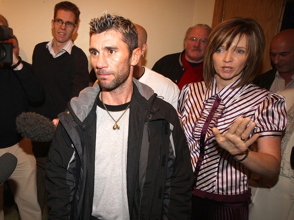 Wayne McCullough, alongside his wife Cheryl, can't hide his disappointment today after the fight was called off
