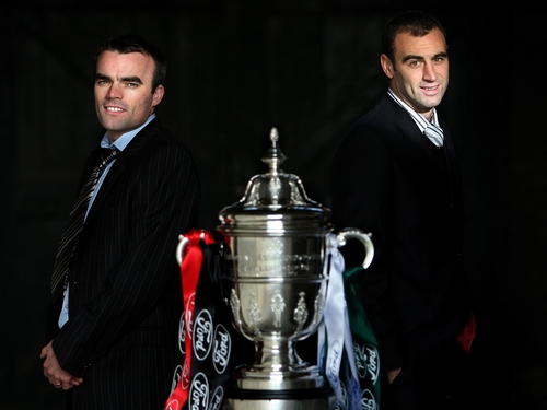 Longford Town Captain Damian Brennan and Cork City's Dan Murray alongside the Cup