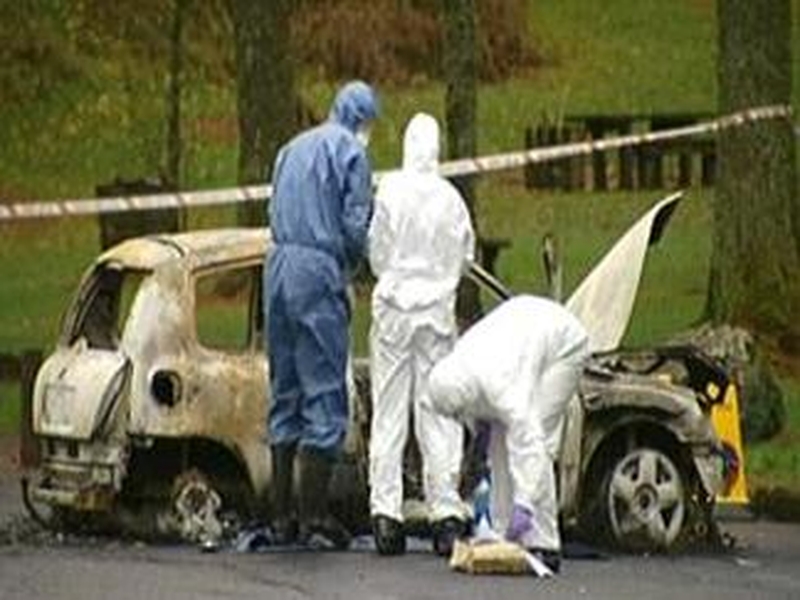 Omagh - Burned out car where body was found -