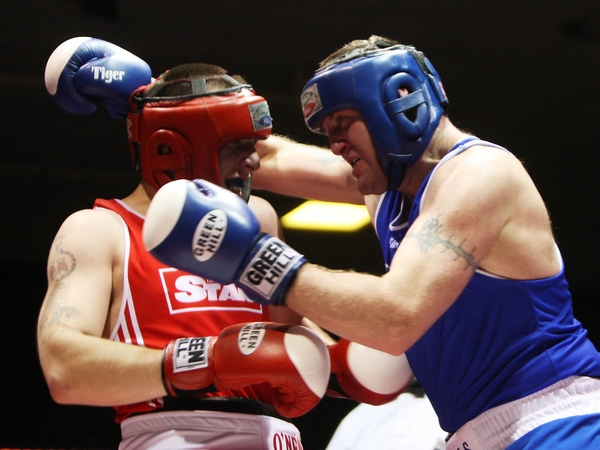 Jimmy Sweeney (red) and Tommy Sheehan in action last night