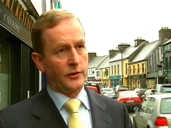 Enda Kenny - Challenges Cowen to confront Ahern