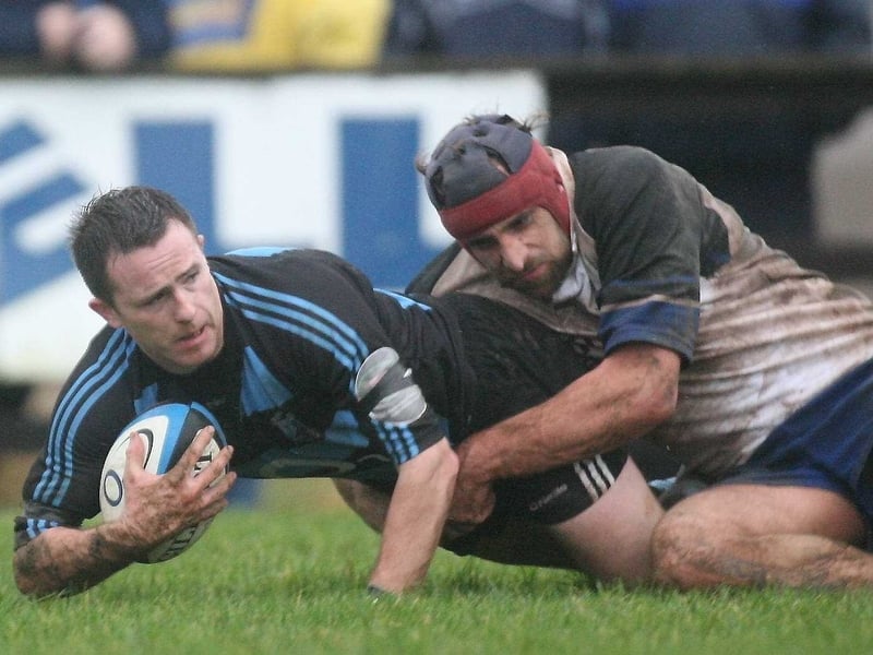 Shannon's Andrew Finn (r) is taken down by Cork Con's Shane O'Connor