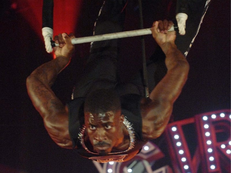 Dwain Chambers - seen here competing on the trapeze in 'Cirque de Celebrite' - has also played American football in NFL Europa