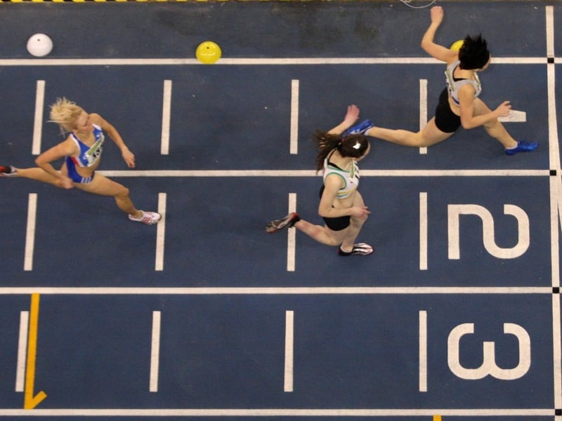 Clare McGlynn wins her 400m race at the Odyssey Arena