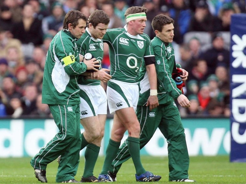 Gordon D'Arcy leaves the field after suffering a fracture to his forearm