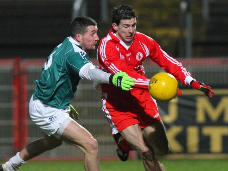 Tyrone's PJ Quinn is challenged by Kildare's Andrew McLoughlin