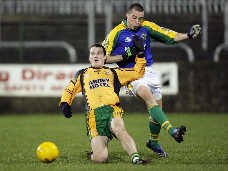 Donegal's Karl Lacey is brought down by Kerry's Kieran Donaghy