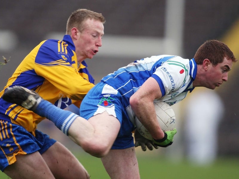Monaghan's Tomás Freeman is tackled by Roscommon's Richard Dooner