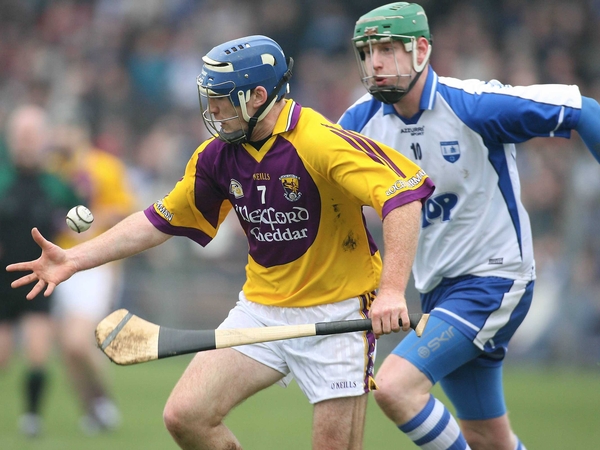 Waterford's Brian Farrell chases Diarmuid Lyng of Wexford