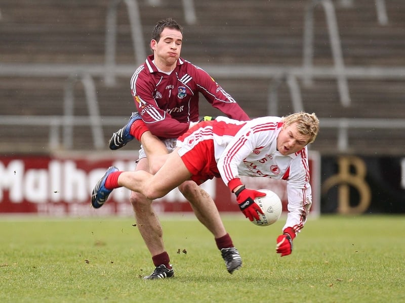 Damien Burke challenges Owen Mulligan at Pearse Stadium today
