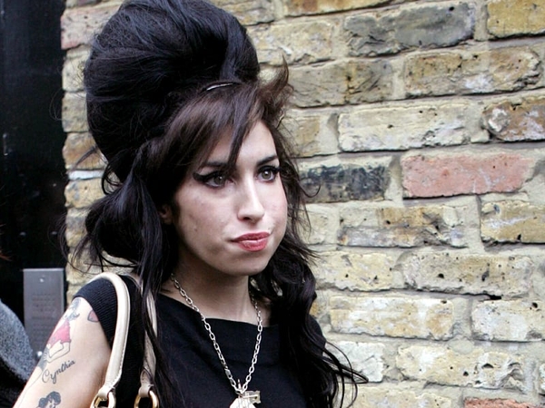 Winehouse - Presented herself at police station yesterday