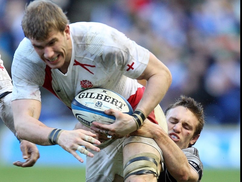 Mike Blair brings down England's Tom Croft