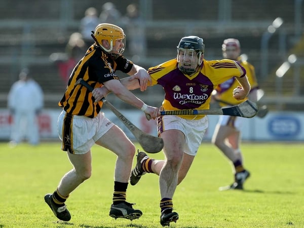 Wexford's Michael Jacob moves from attack to defence for the Model men
