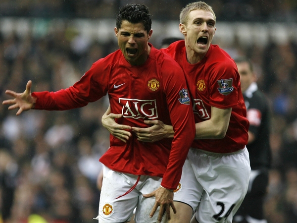 Cristiano Ronaldo, who has an incredible goalscoring record this season, celebrates with Darren Fletcher