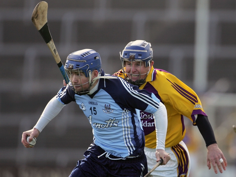 Dublin's Peadar Carton is closed down by Malachy Travers of Wexford