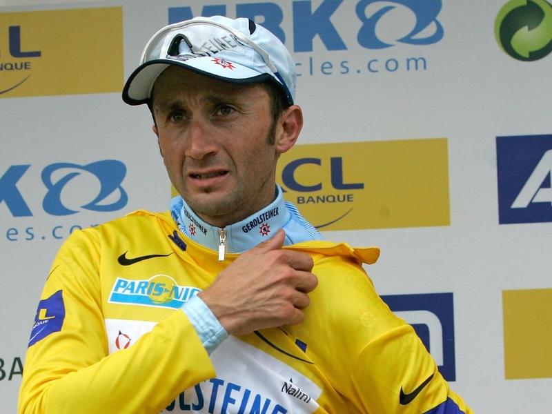 Davide Rebellin don's the leader's yellow jersey