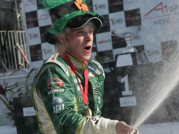 Adam Carroll claimed victory in Malaysia and leads the A1GP Championship