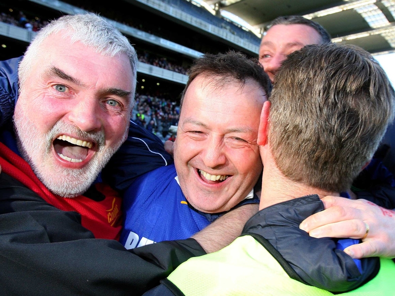 Portumna manager Jimmy Heverin (centre) celebrates at the final whistle