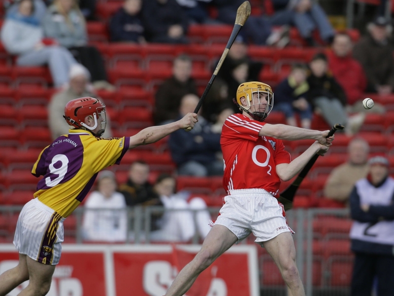 Cathal Naughton, seen here under pressure from Tommy Dwyer, claimed a crucial point for the Rebels this afternoon