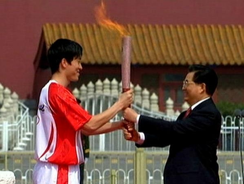 Olympic flame - Torches lit from separate backup lamps