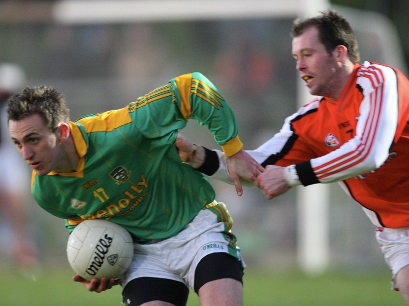 Meath's Graham Reilly has Ciaran McKeever breathing down his neck