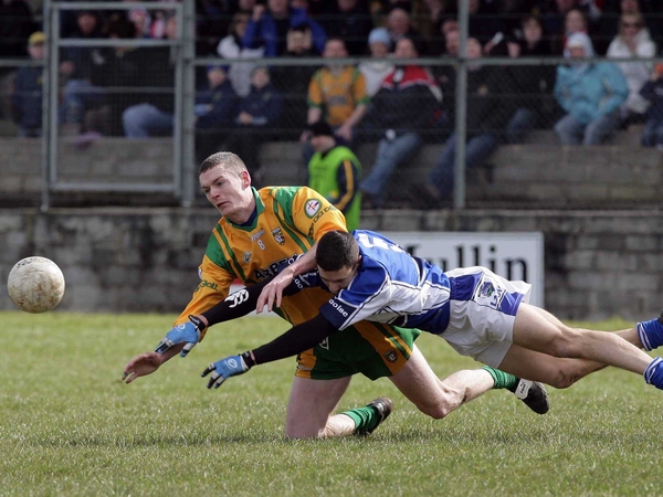 Kevin Rafferty &amp; David Murphy challenge for the ball in Ballyshannon this afternoon