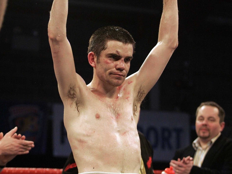 Bernard Dunne takes on Argentina' Damian Marchiano in Dublin on 12 July