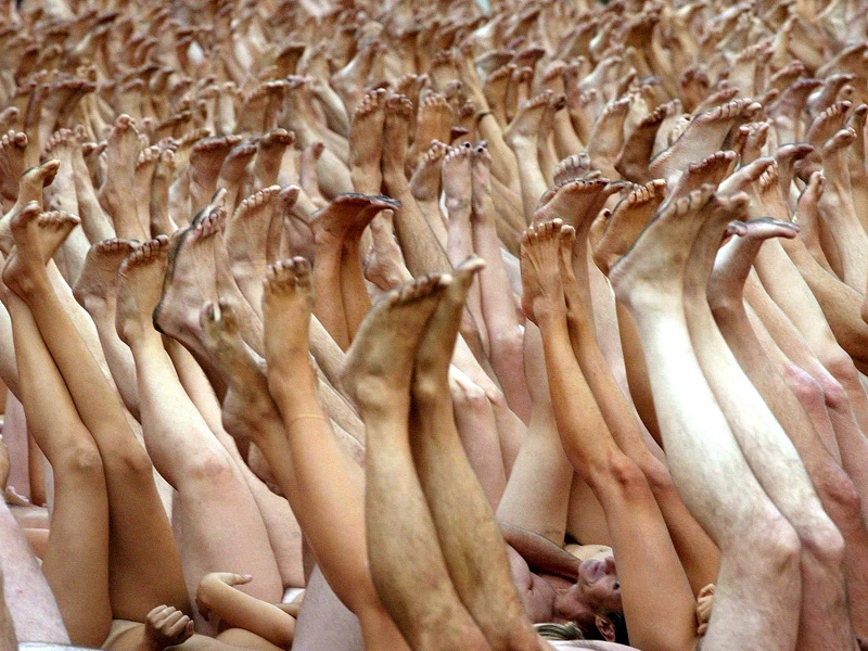 Tunick - Has staged installations around the world